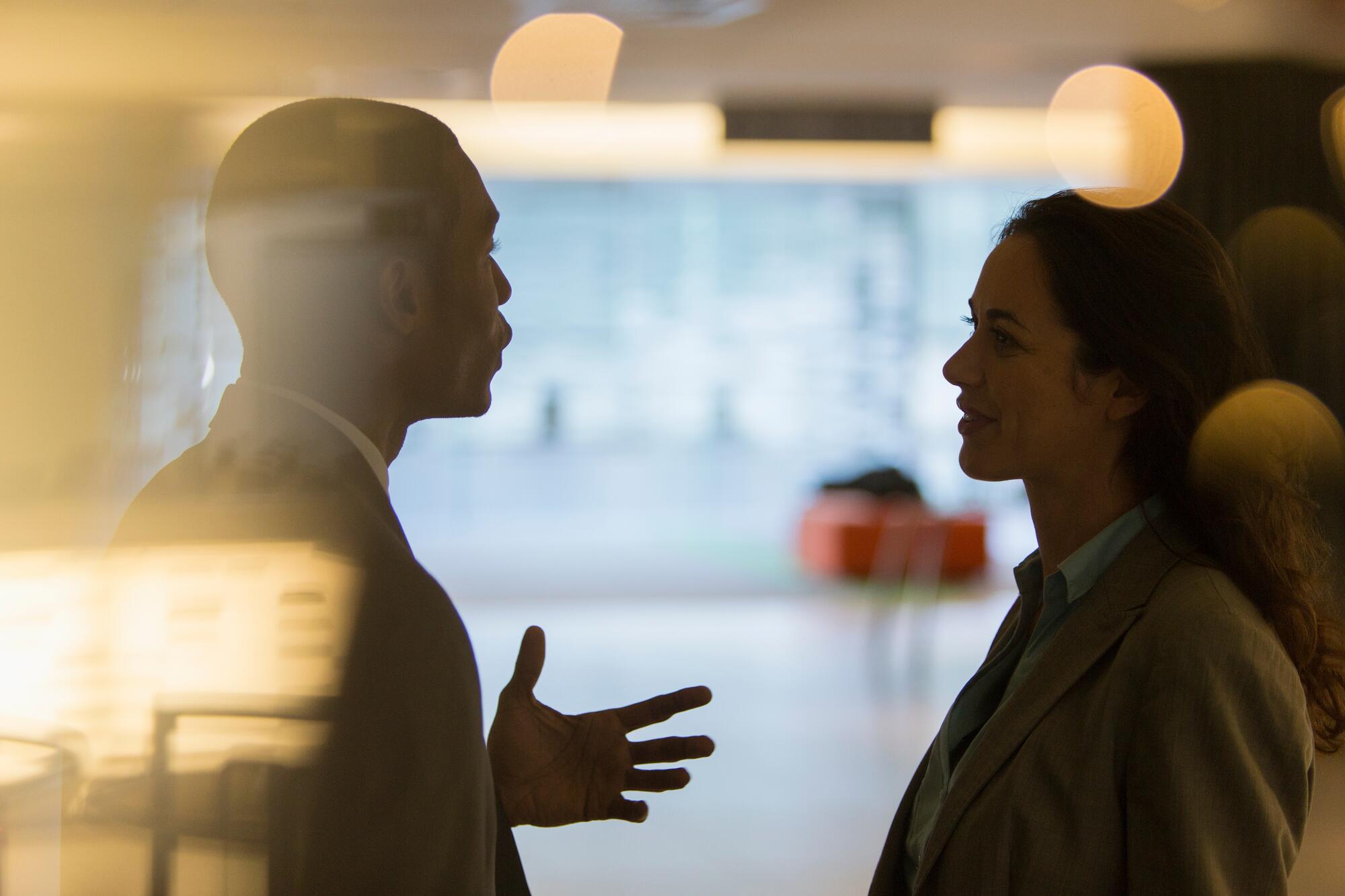 professionals discussing financial data